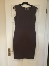 Grey dress with bead and detail