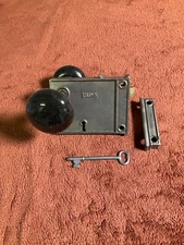 Antique Steel Russwin Rim Door Lockset, Brass Throws, 2 Black Porcelain Knobs