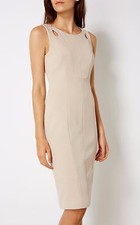 Lot de vêtements divers dont un tailleur en soie rose composé d'une