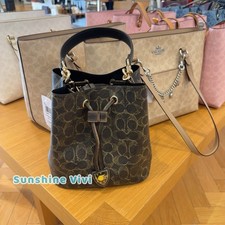 NWT Coach Rowan Bucket Bag Loved Signature Canvas With Charms Gold/Brown CDY21