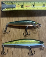 Two lures Rapala Husky Jerk #8 Crankbait and unknown stick bait