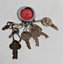 Paul's Conoco service Oakland, Iowa keychain and keys vintage