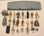 Vintage Star Wars Action Figures, Collector's Action Stand, and spare parts