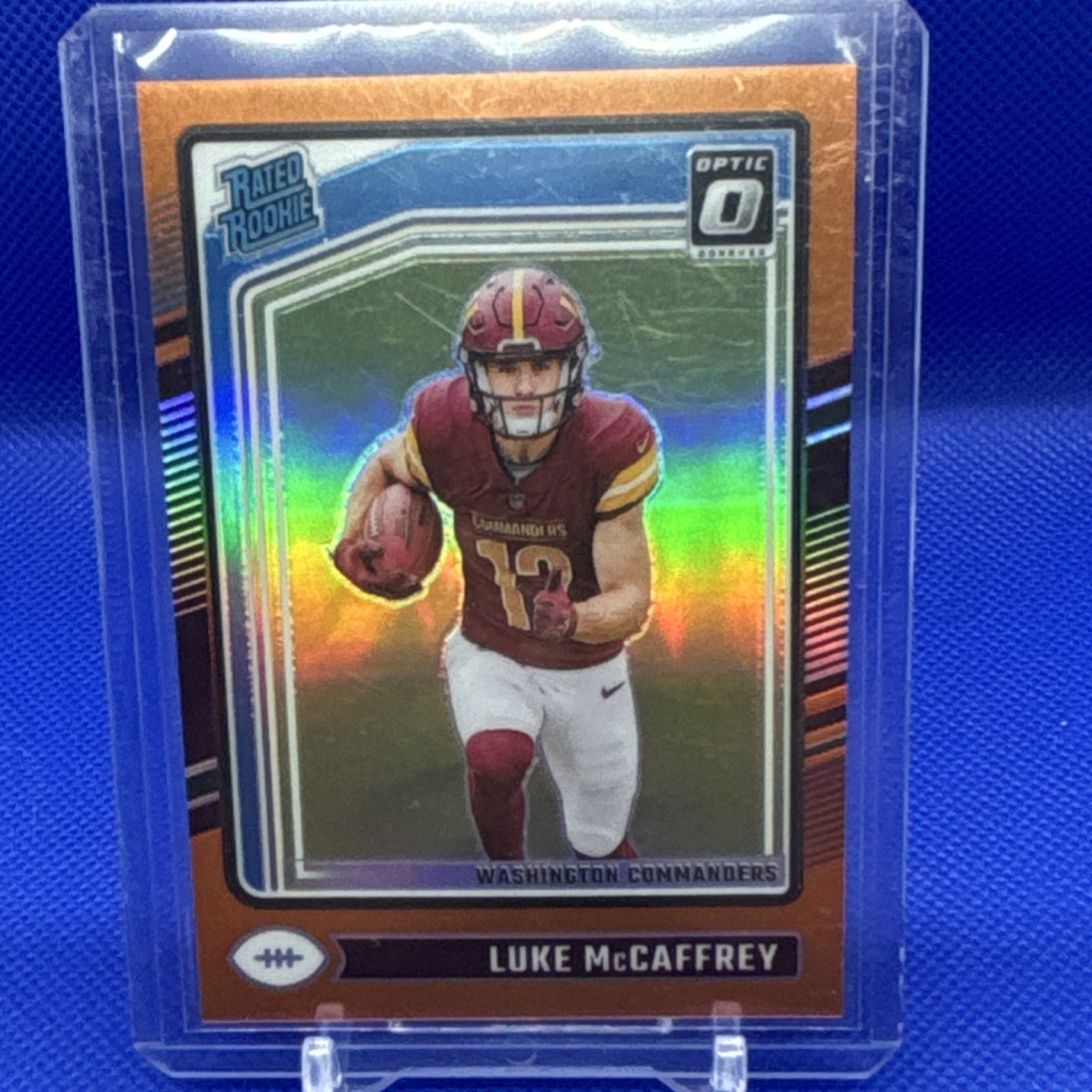 2024 Panini Donruss Optic Rated Rookie Luke McCaffrey #268 Orange Prizm /249