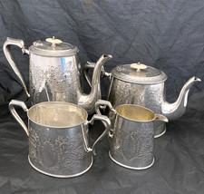 Antique quality silverplated 4 piece tea/coffee set.
