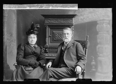 Photo:Mrs. T.F. Wright and Man Portrait Studio Seated