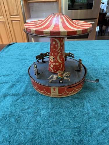 VINTAGE WOLVERINE CLOCKWORK/WIND UP MERRY-GO-ROUND~Model 30 Nice Works