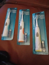 New With Battery Luminant Battery Powered Toothbrush Light Yellow Accents Soft