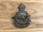 smart looking original GVI WW2 era royal military academy sandhurst cap badge
