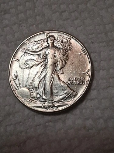 1942 Walking Liberty Half Dollar In Fine To VF Condition In My Opinion. #404