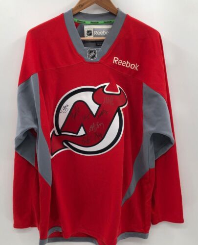 New Jersey Devils Reebok Jersey signed by Martin Brodeur and six other players.