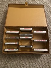 1980s cassette tapes with carrying case  
