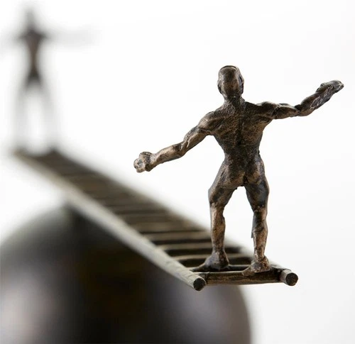 Eclectic Bronze Sculpture of Men Balancing on Orb - Picture 3 of 4