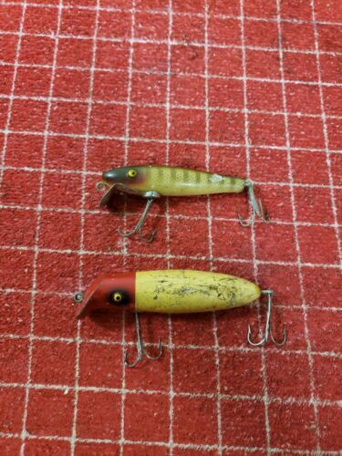 Vintage 4 3/8 Paw Paw wooden Famous Pikie Getum #1000 fishing lure with  tack eyes - AAA Auction and Realty