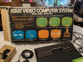 ATARI CX-2600A  VIDEO COMPUTER SYSTEM 1980 16 Games Pac Man Xtra Controls + More