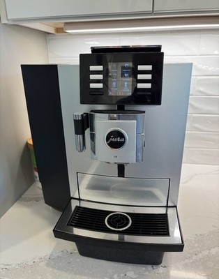 Jura X8 Platinum Automatic Coffee Machine, complete with the profe