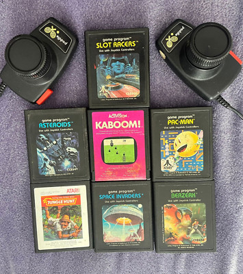 Atari 2600 Games Lot of 7 Retro Video Games, including untested paddles with lot