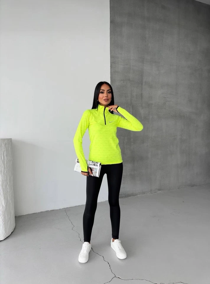 Conjunto de leggings e top Nike Fast Dri-Fit com zíper quarto...tamanho X-grande...cor verde neon. - Imagem 3 de 3