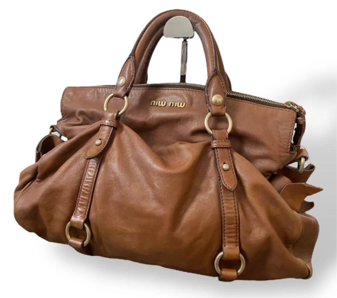 Borsa a mano Miu Miu Vitello Lux in pelle con nastro marrone tono oro ferramenta buona