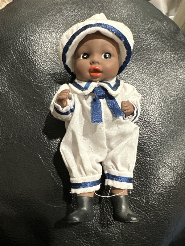 African Porcelain Sailor Boy Doll