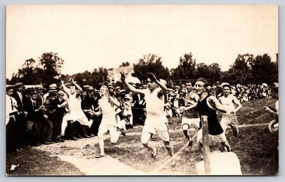 Outdoor Track & Field Event With Large Spectator Crowd Watching a Sprint RPPC