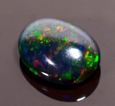 Natural Black Ethiopian Opal Oval Shape Cabochon Loose Gemstone 3 Cts 12X9X5 mm