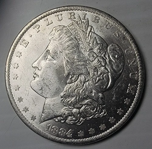 1884-O MORGAN SILVER DOLLAR IN HIGH-QUALITY CONDITION, EXCELLENT DETAIL - AU