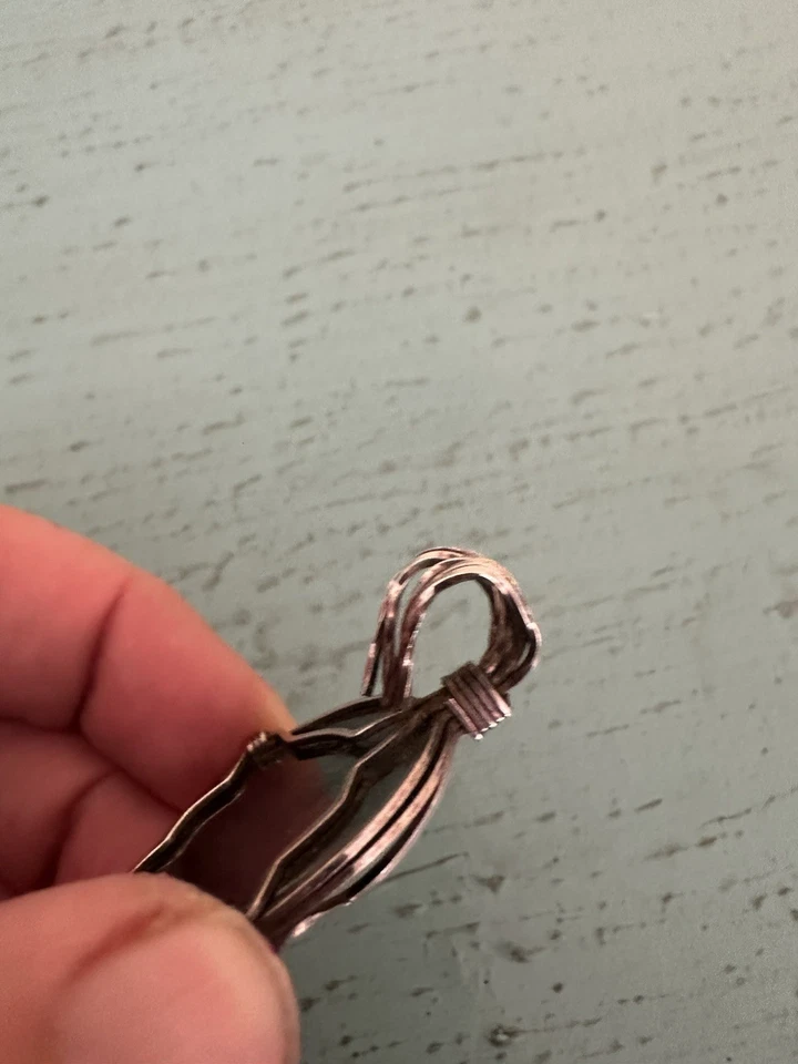 Colgante de hematita envuelto en plata Foto 4 de 4