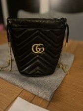 Gucci GG Marmont Drawstring Bucket Bag Quilted Leather Black 575163 Crossbody