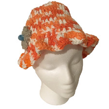 Crocheted hat for girls in orange/white cotton yarn. Handmade. New