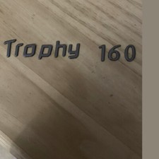 Mg Tf Trophy Badge Dark Grey With 3m Adhesive Backing