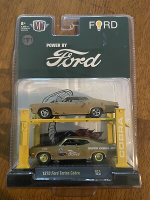 M2 1970 FORD TORINO COBRA AUTO LIFT 2 PACK  CHASE! NISP  LIMITED EDITION GOLD