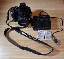 Nikon COOLPIX P90 Digital Camera 12.1 MP 24X Zoom Dual Charger 2 batteries Strap