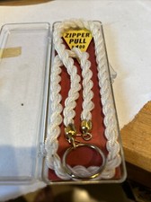 VINTAGE ZIP IT YOURSELF DRESS ZIPPER PULL, CORDED HOOK, DAVID TRAUM CO USA