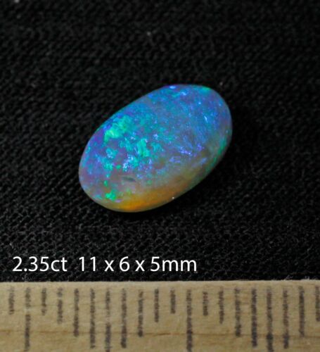 LIGHTNING RIDGE SOLID SEMI-BLACK OPAL GEM WITH GREEN AQUA BLUE COLOURS 2.35ct - Picture 2 of 7