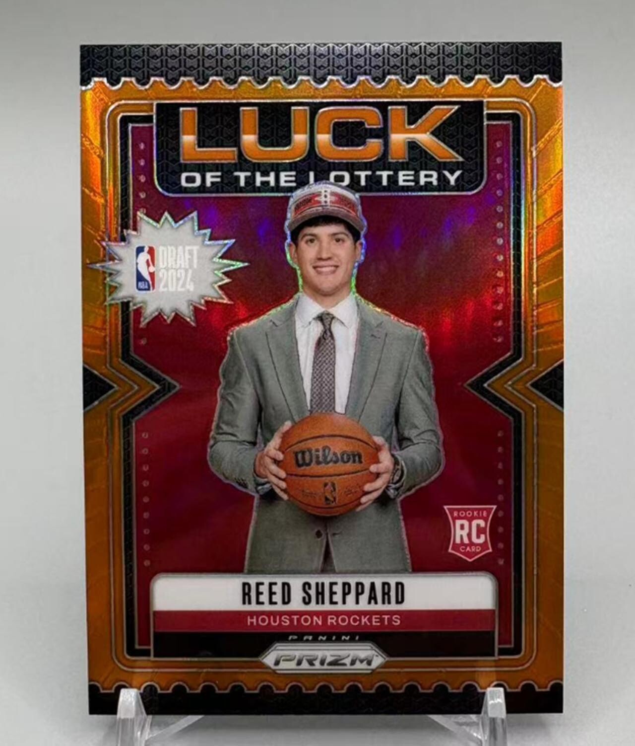 Reed Sheppard 2024-25 Panini Prizm Luck of the Lottery Orange Prizm 42/49 RC #1