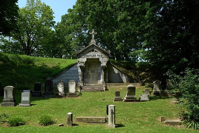 Mausoleum and gravestones at Mount Hope Cemetery in Rochester, New York