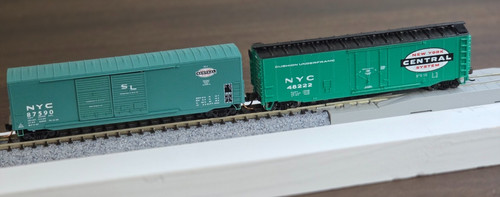 PAR DE VAGONES DE CARGA CENTRAL ESCALA NY MTL 18200020 Rd# 87590 BACHMANN 71070 Rd# 48222 | Condition: Used