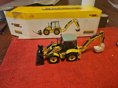1/50 TRACTO PELLE NEW HOLLAND .nzg 817 - Photo 1/2