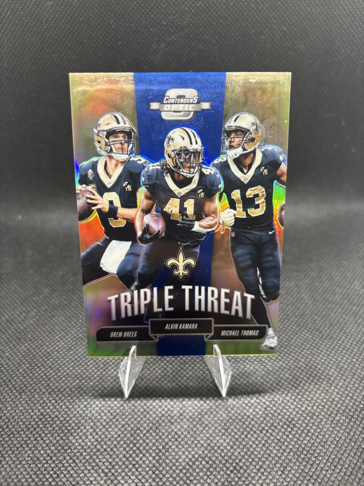 2018 Contenders Optic - Triple Threat Brees, Kamara, Thomas #TT-NOS Blue /25