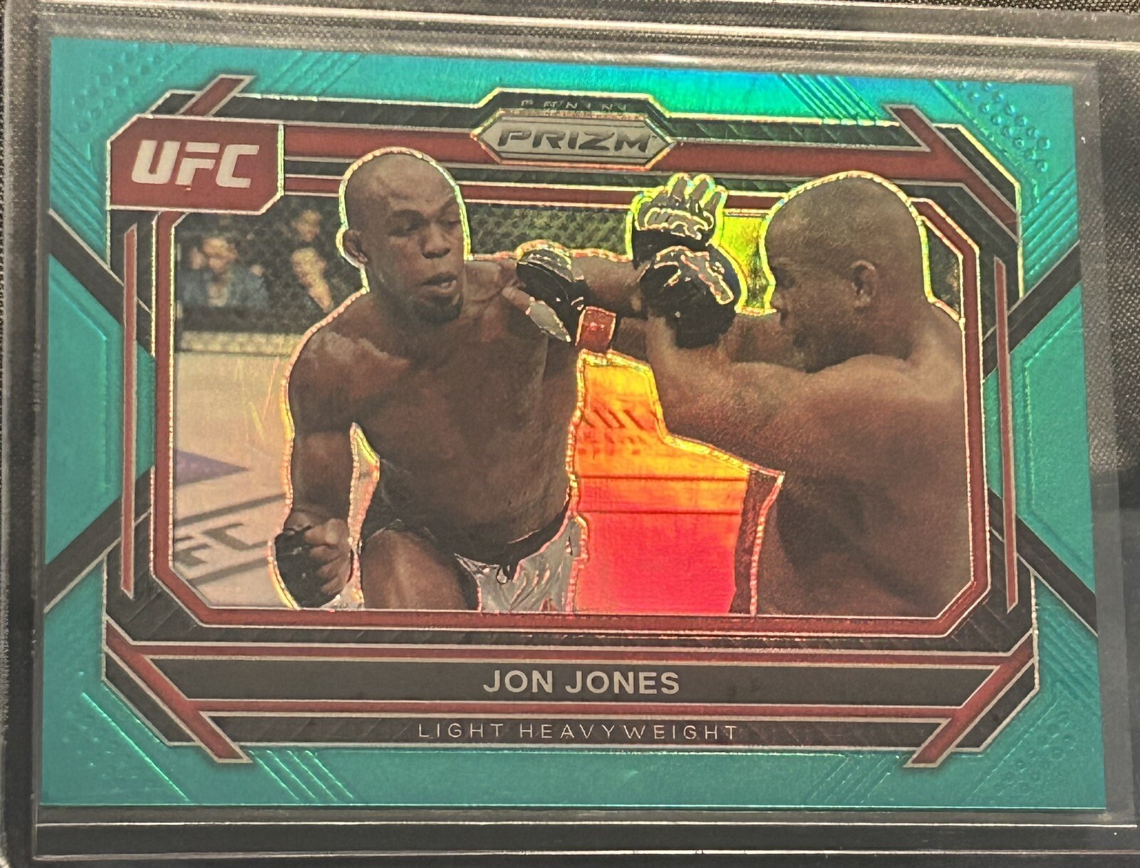 JON JONES 2023 Panini Prizm UFC #74 Teal Prizm #'d. 27/49