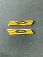 OAKLEY SUTRO LITE SUNGLASSES REPLACEMENT SIDE LOGO ICON TEMPLE GOLD & BLACK TAG