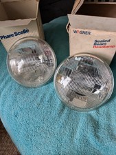 2 Wagner 4000 Low Beam Headlights 5 34 Diameter Bulb New Old Stock 2 Wagner 4000 Low Beam Headlights 5 34 Diameter Bulb New Old Stock