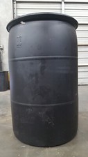 55 gallon barrel drum black plastic 4 pack that had mineral oil in them