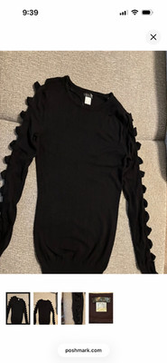 Long sleeve black sweater from Venus with arm cut outs in a size medium