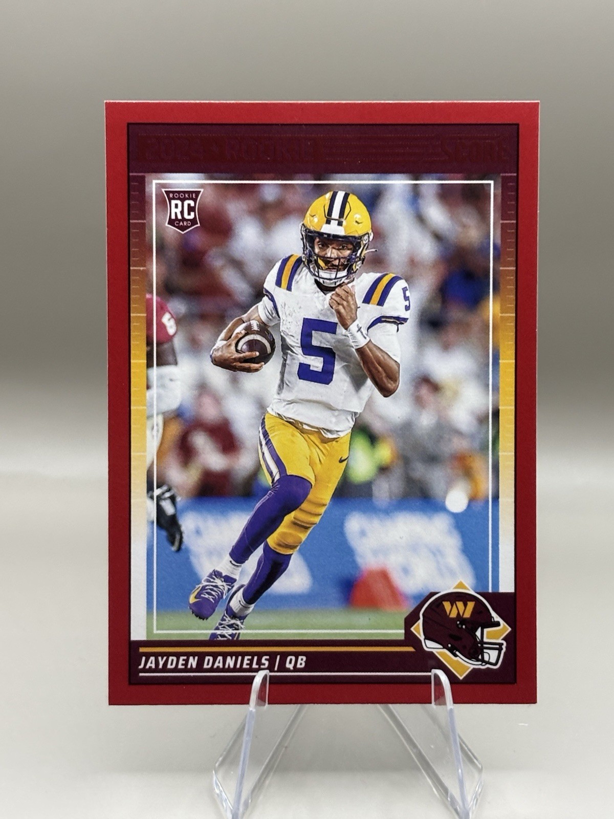 2024 Score - Rookies Jayden Daniels #302 Red Border (RC) Washington Commanders
