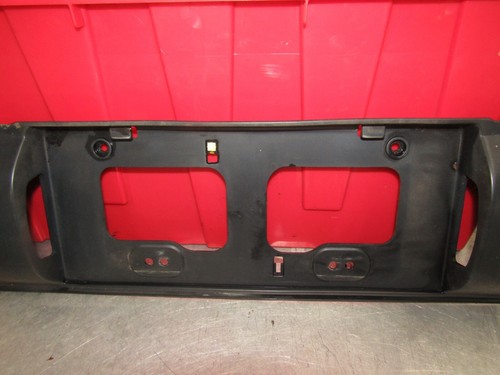1988-1992 Toyota Corolla sedan OEM trunk trim license plate garnish (broken tab) - Picture 3 of 7