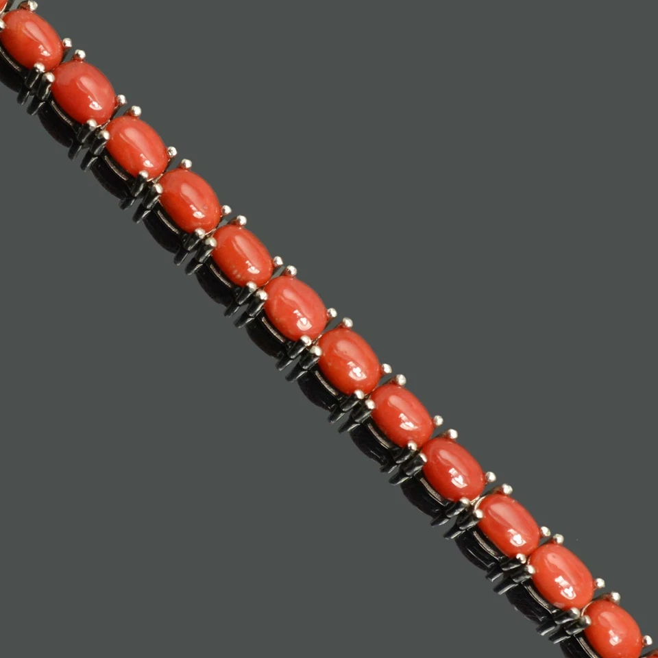 Brazalete de tenis de plata de ley 925 con piedras preciosas de coral creadas en laboratorio de corte ovalado de 9 quilates Foto 3 de 4