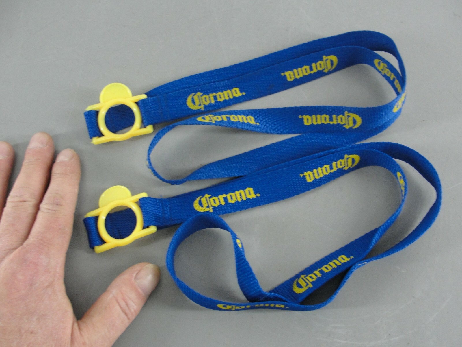 CORONA BEER LOT 2 BLUE YELLOW NO HANDS FREE BOTTLE NECK HOLDER LANYARD NEW