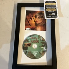 TAYLOR SWIFT SIGNED AUTOGRAPH LIFE OF A SHOWGIRL FRAMED CD  JSA COA PHOTO #1